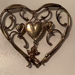 Vintage costume, jewelry piece, possibly buy Joseff of hollywood heart brooch
